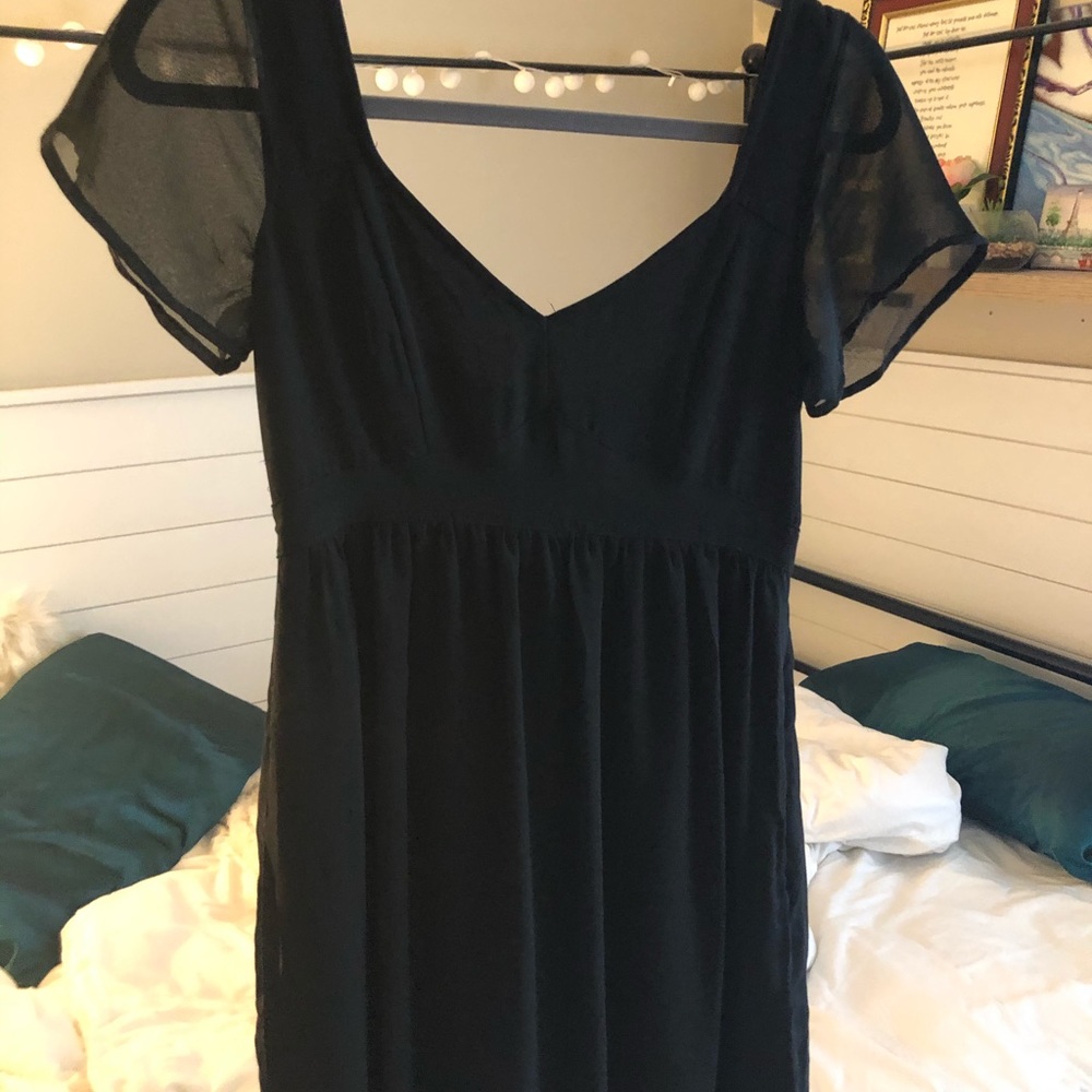 Black mini dress with sheer cap sleeves